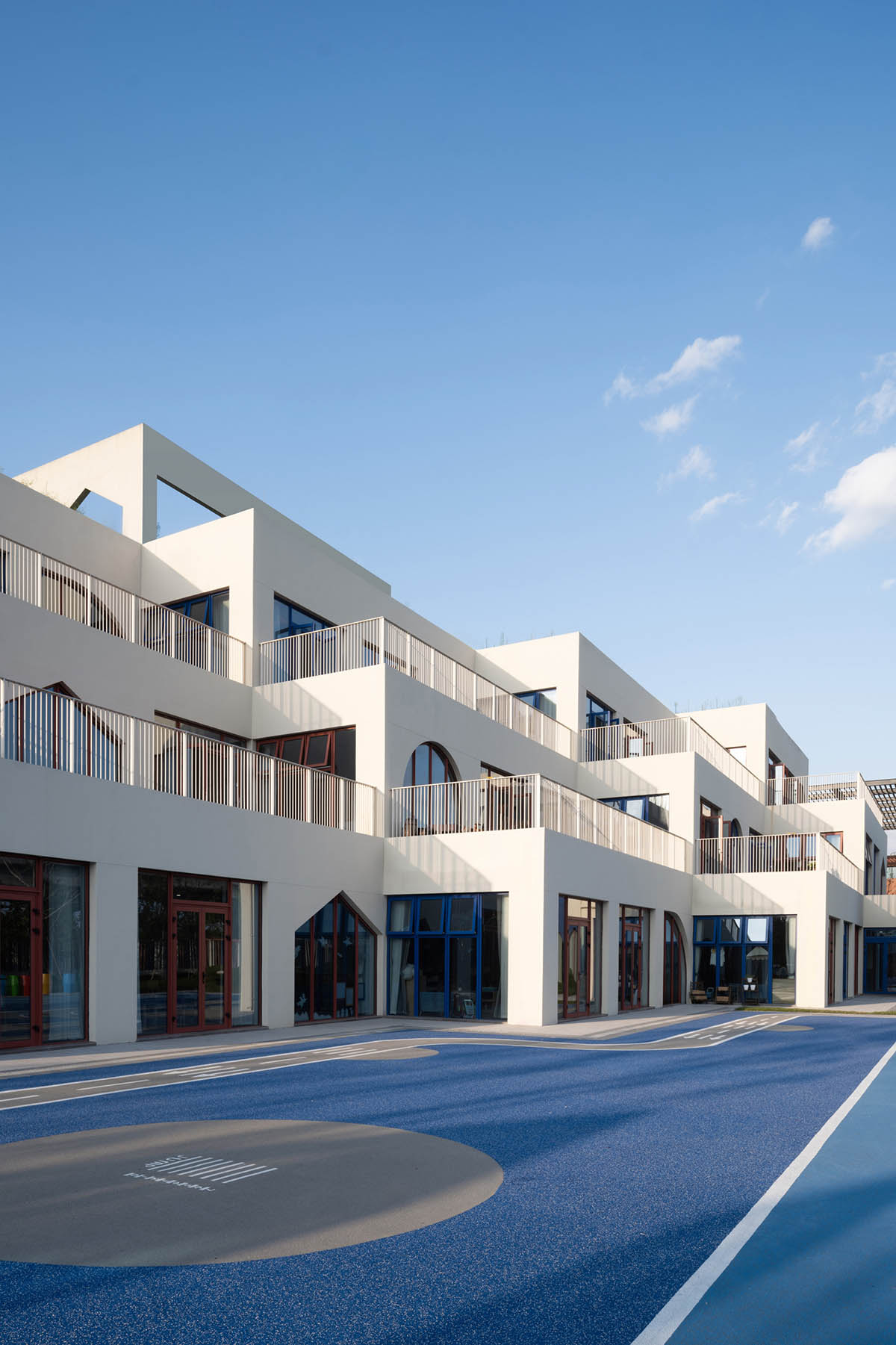 CLOU architects completes kindergarten with white stacked blocks in Liangzhu