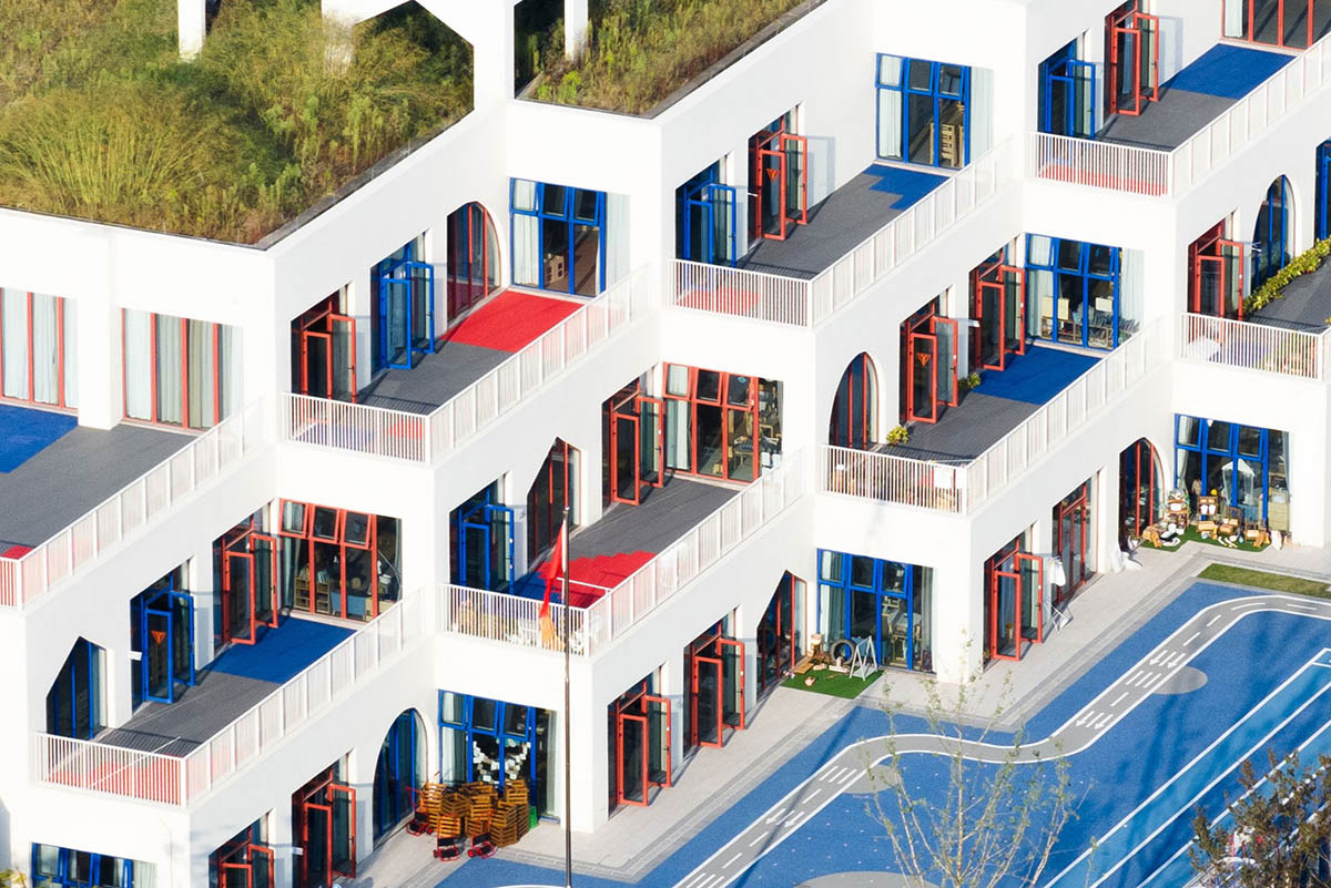 CLOU architects completes kindergarten with white stacked blocks in Liangzhu