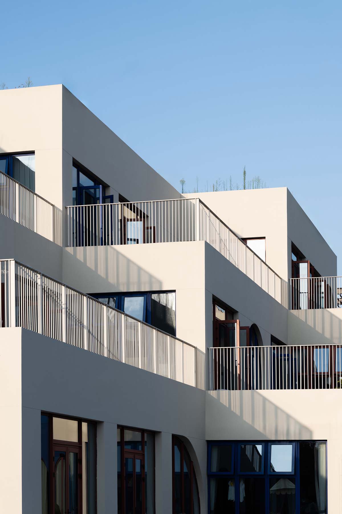 CLOU architects completes kindergarten with white stacked blocks in Liangzhu
