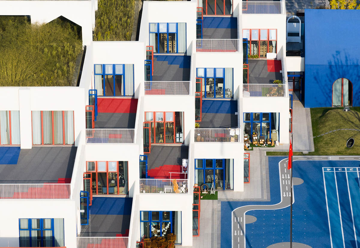 CLOU architects completes kindergarten with white stacked blocks in Liangzhu