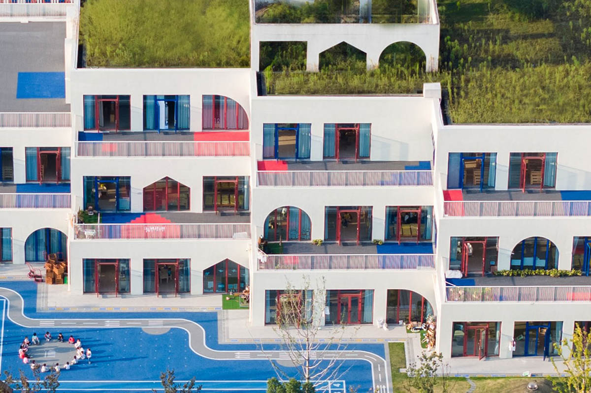 CLOU architects completes kindergarten with white stacked blocks in Liangzhu