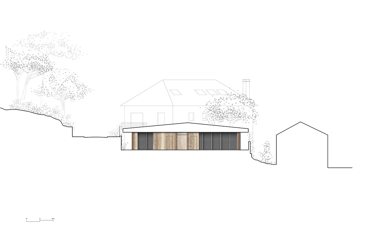 Atelier Delalande Tabourin creates a wooden sunken pavilion that arouses curiosity for visitors