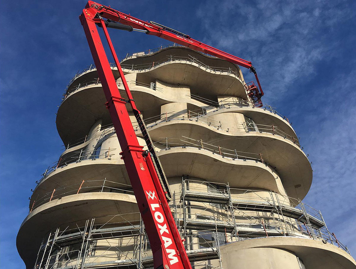 Farshid Moussavi’s curvaceous La Folie Divine tower nears completion in Montpellier