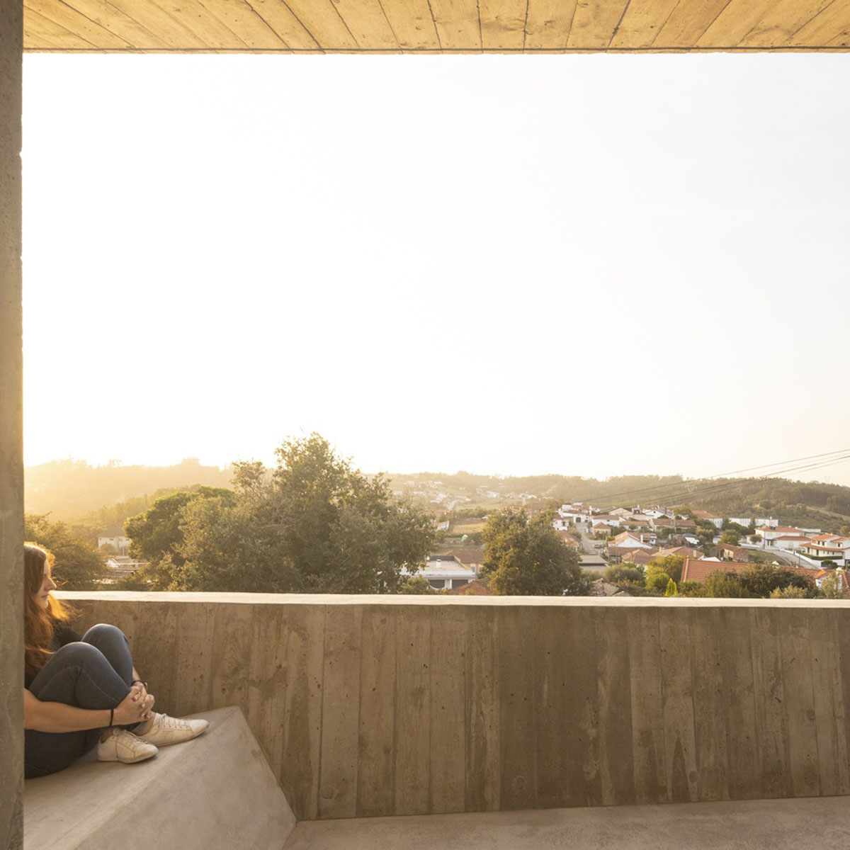 Contaminar Arquitectos built cave-like house from irregular walls inspired by rocky topography