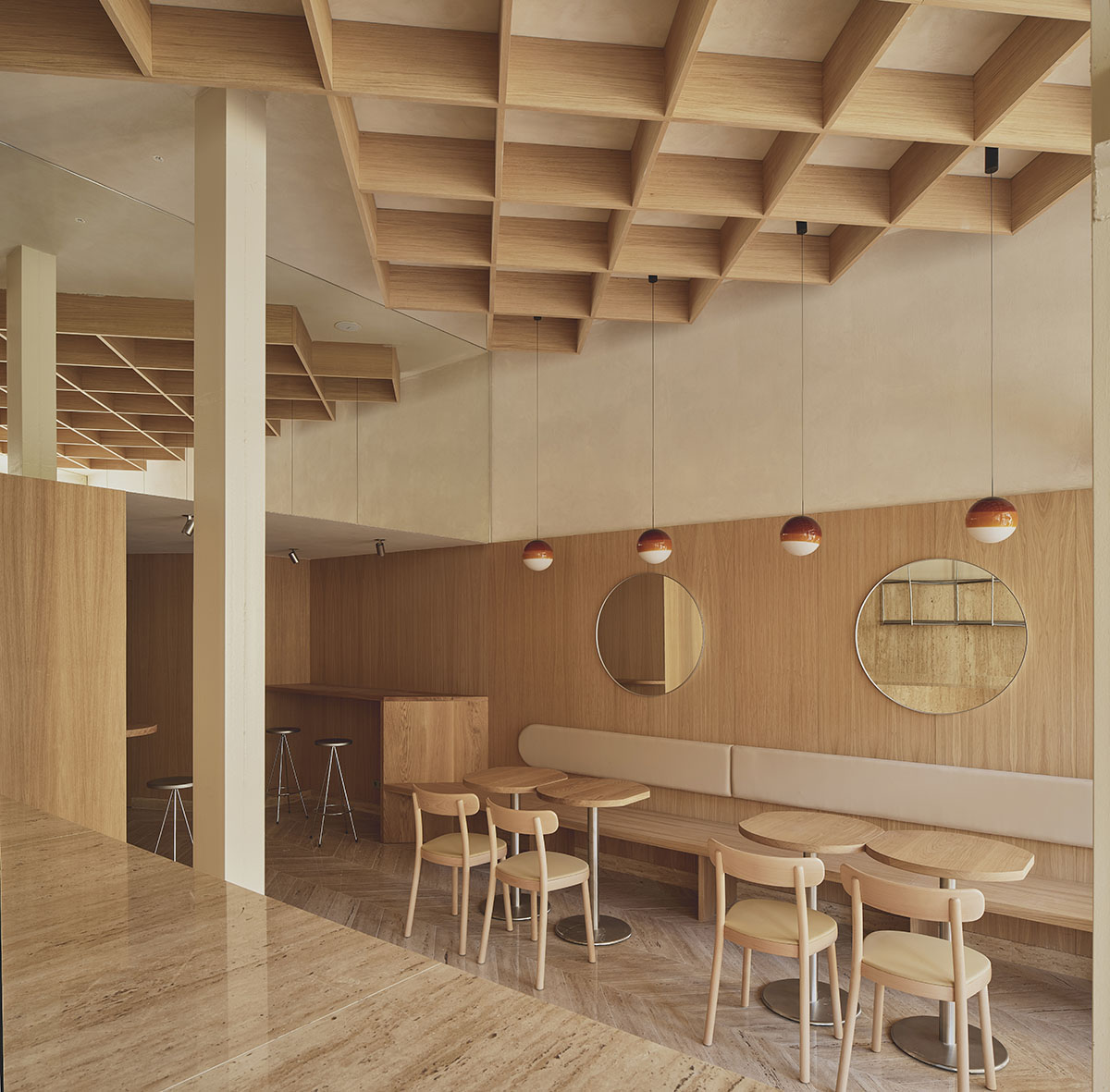 Zooco creates a unique ice cream experience with cozy, wood-themed interiors in Santander, Spain