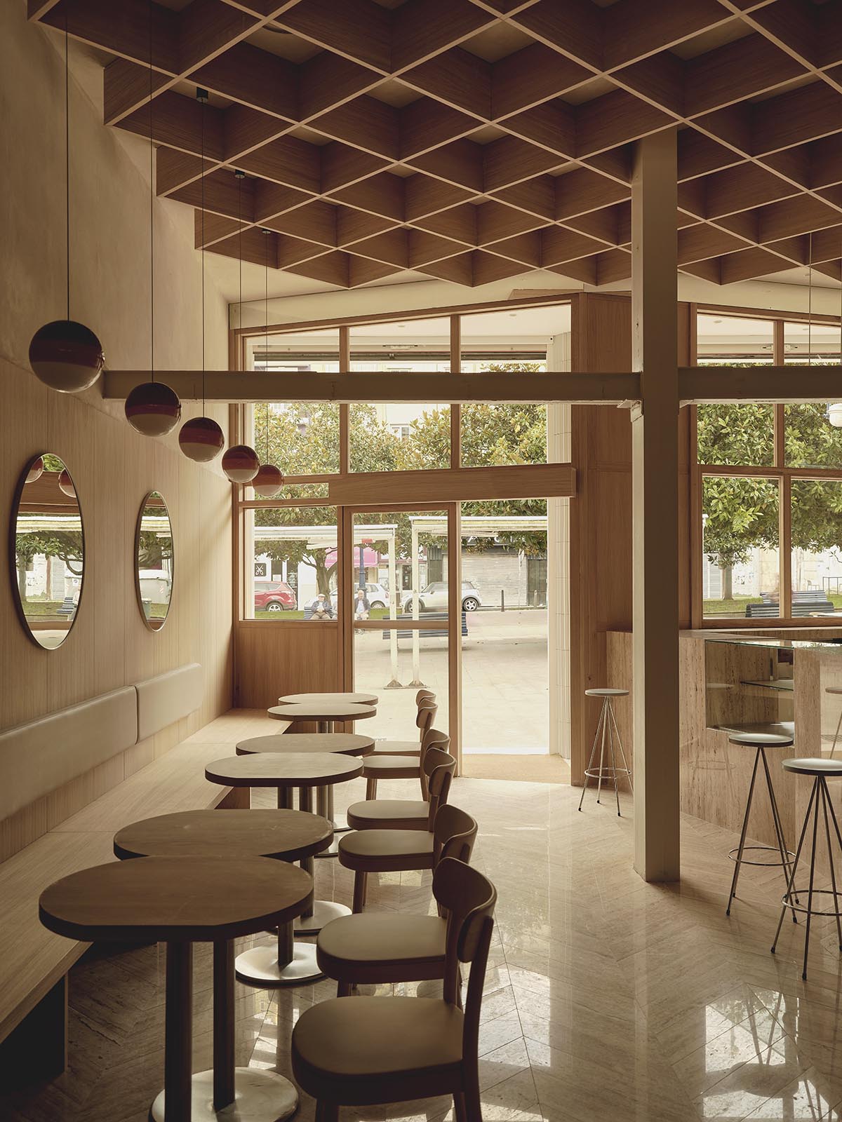 Zooco creates a unique ice cream experience with cozy, wood-themed interiors in Santander, Spain