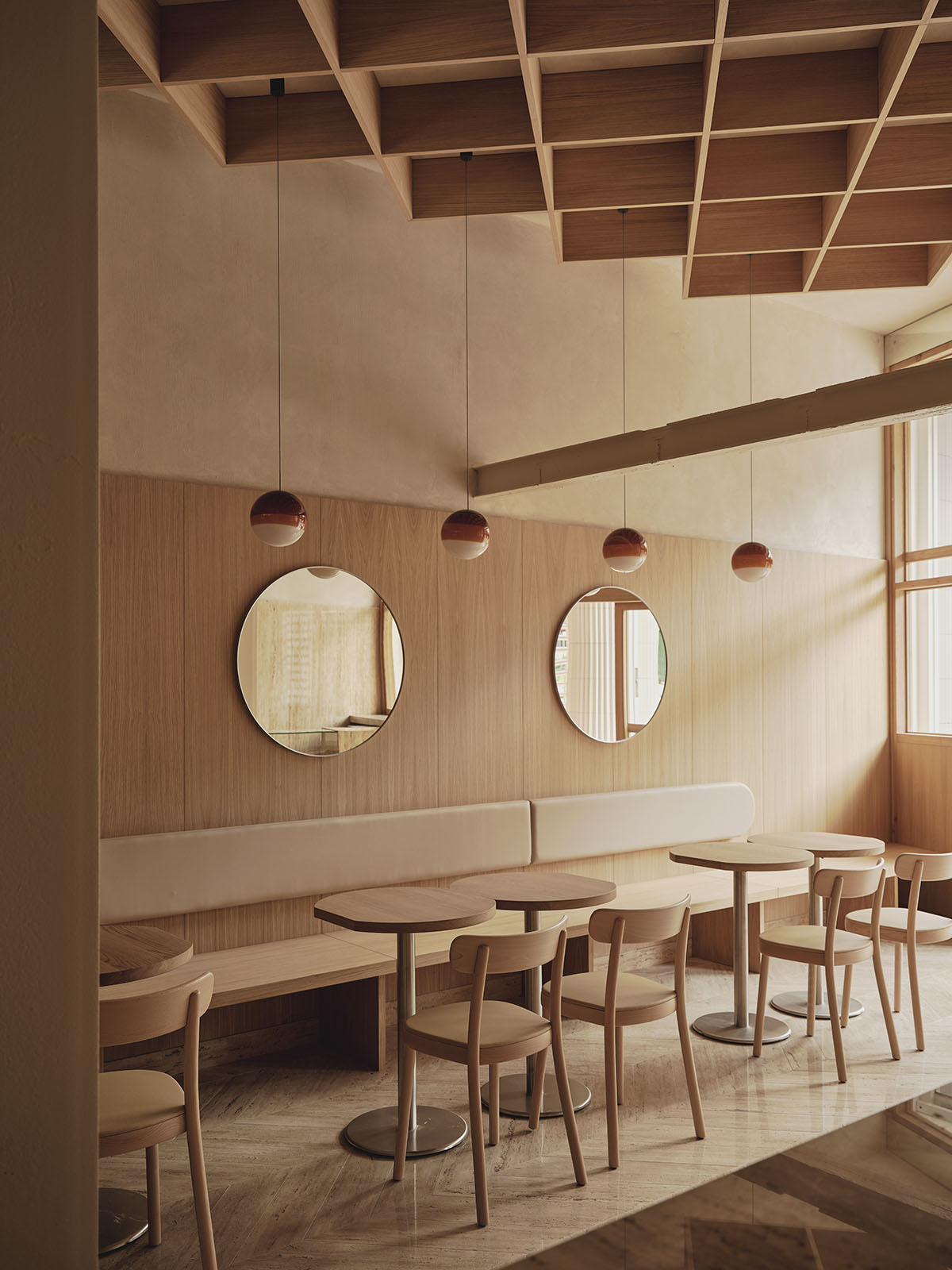 Zooco creates a unique ice cream experience with cozy, wood-themed interiors in Santander, Spain