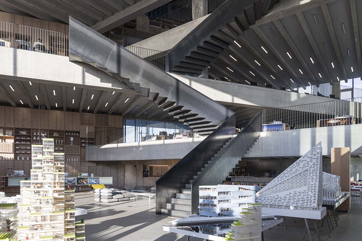 BIG designs its new HQ around one column and a giant staircase on Copenhagen harbor