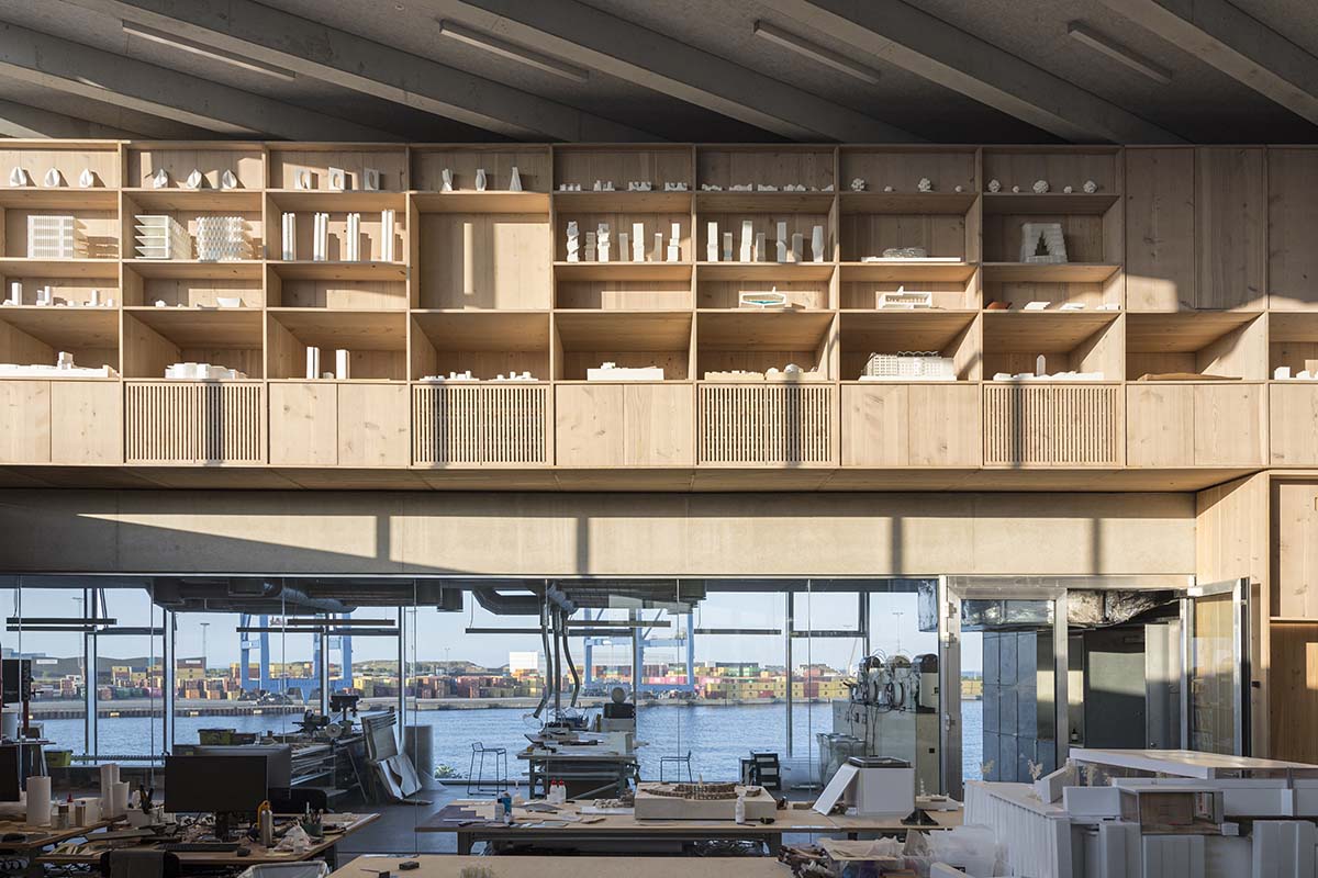 BIG designs its new HQ around one column and a giant staircase on Copenhagen harbor