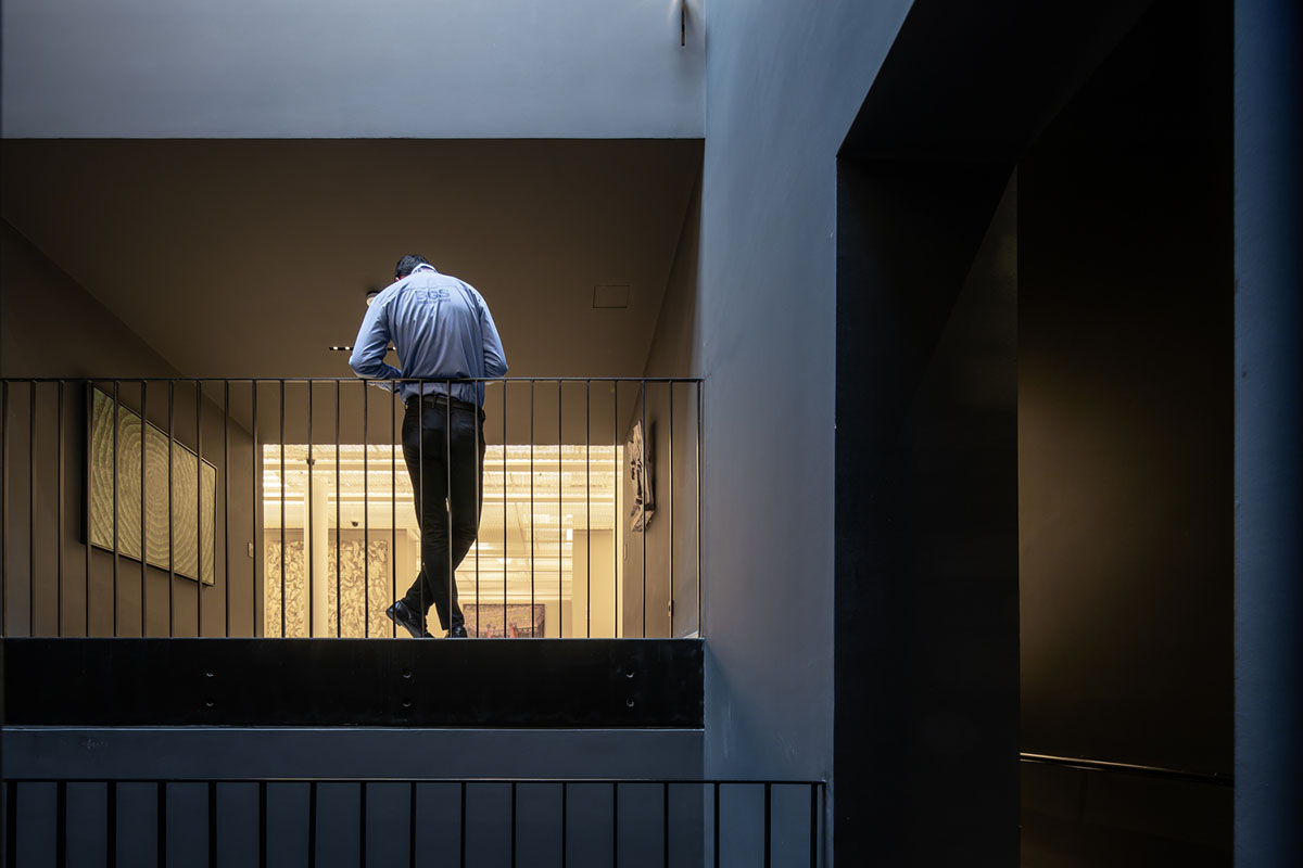 YTAA converts old villa into a museum with irregular dark surfaces and glazed base in Bucharest