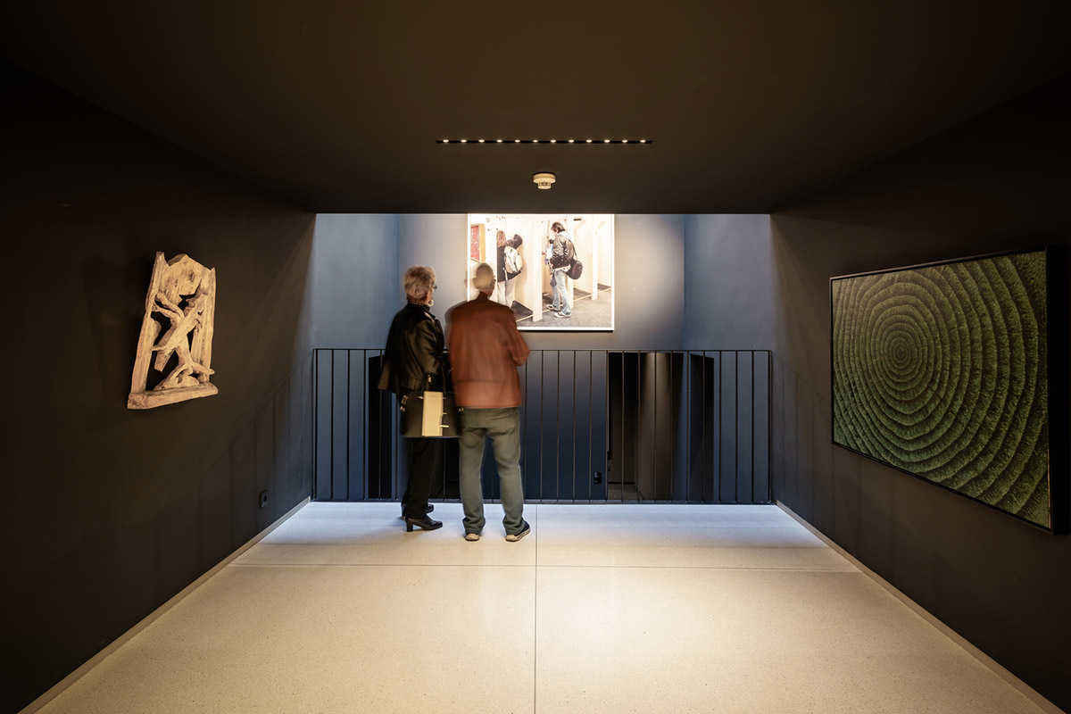 YTAA converts old villa into a museum with irregular dark surfaces and glazed base in Bucharest