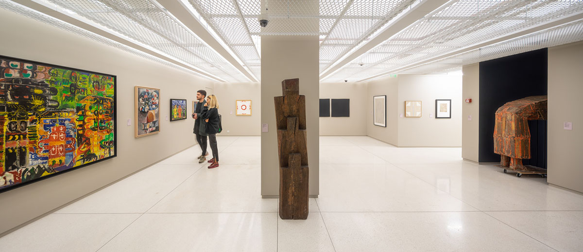 YTAA converts old villa into a museum with irregular dark surfaces and glazed base in Bucharest