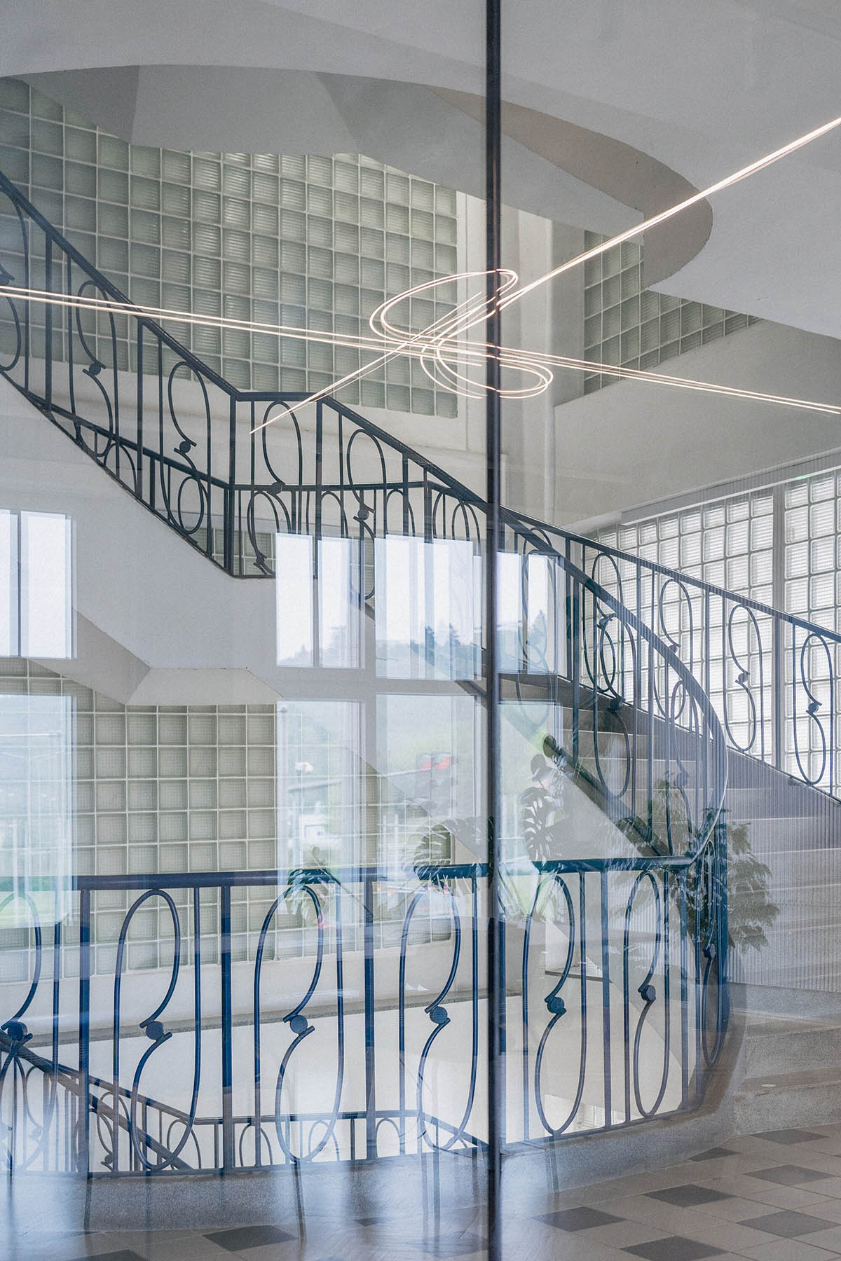 Studio Cosmo revitalizes Pudis offices featuring a stainless steel backdrop in Prague