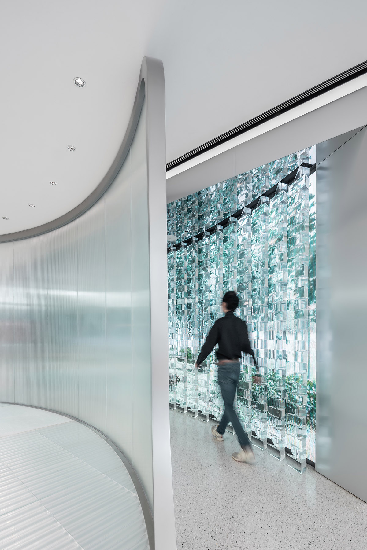 UNStudio designs store with extruded metallic tubes for mobile phone brand OPPO in Guangzhou