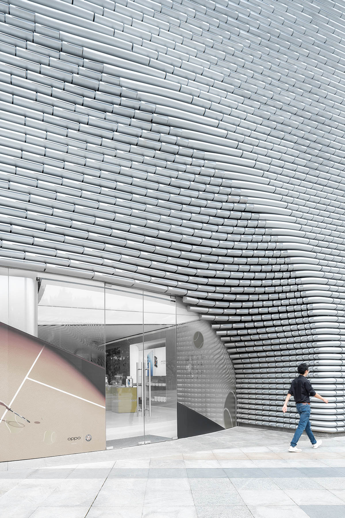 UNStudio designs store with extruded metallic tubes for mobile phone brand OPPO in Guangzhou