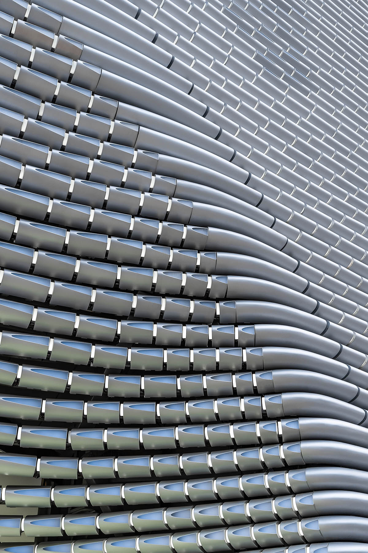 UNStudio designs store with extruded metallic tubes for mobile phone brand OPPO in Guangzhou