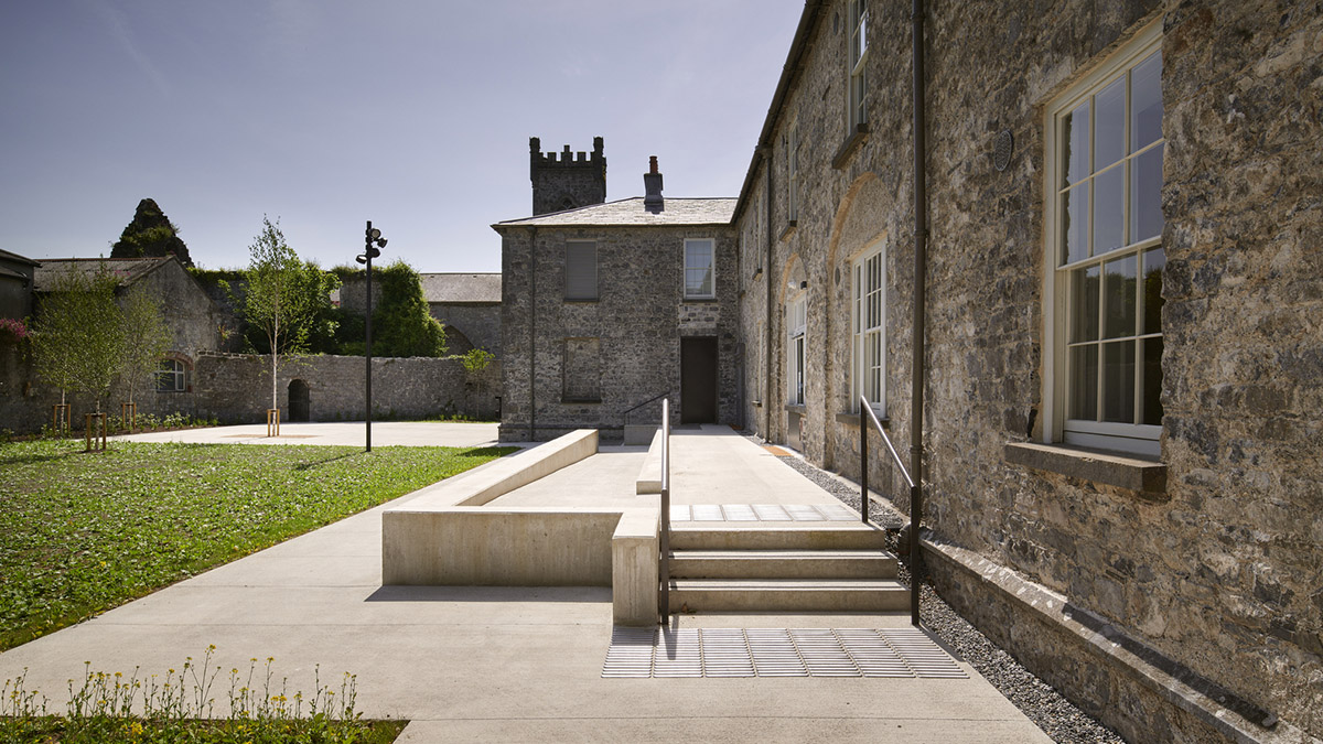 Mccullough Mulvin Architects adds two metal-clad volumes to convert former almshouse into art gallery