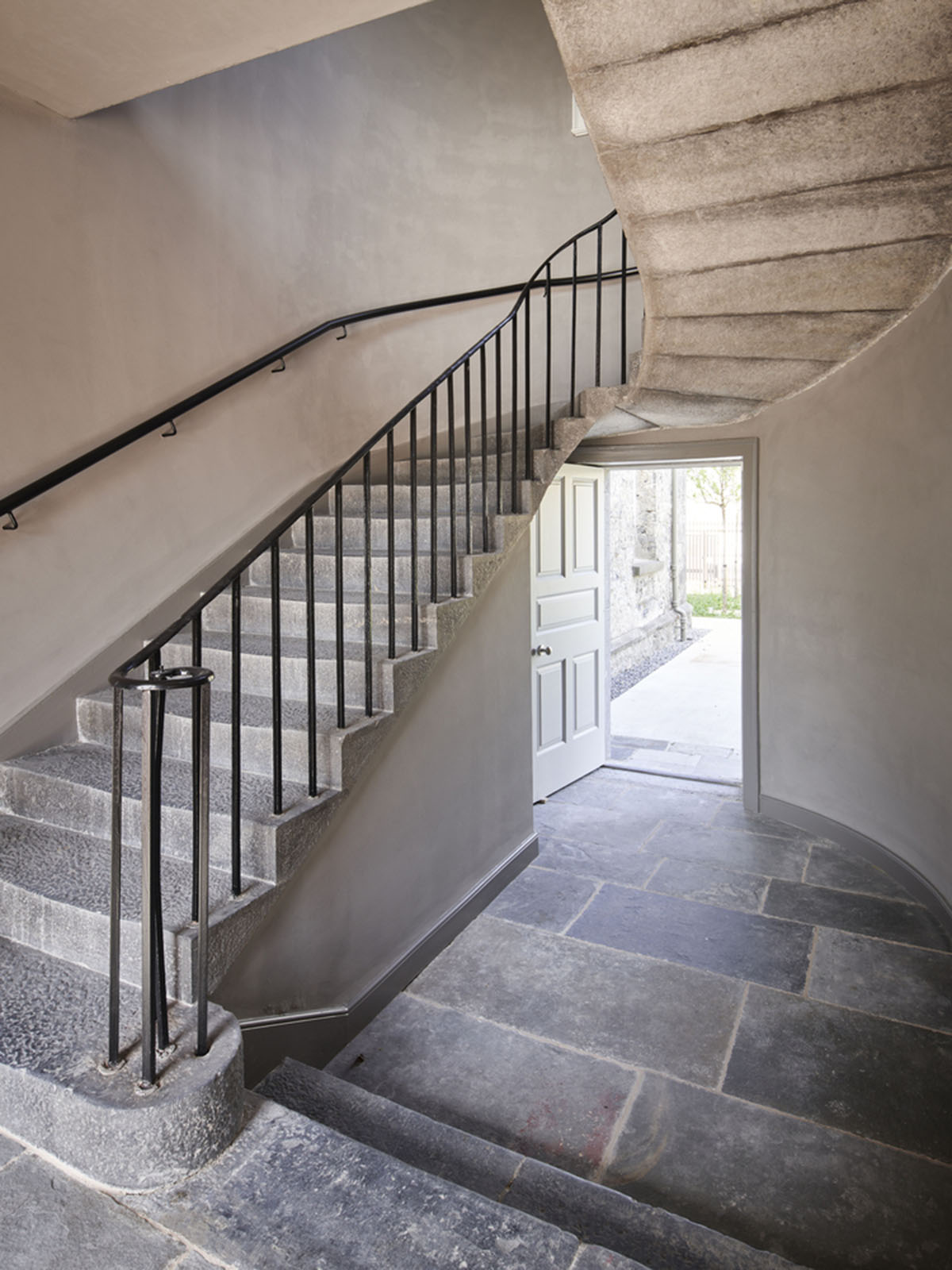 Mccullough Mulvin Architects adds two metal-clad volumes to convert former almshouse into art gallery