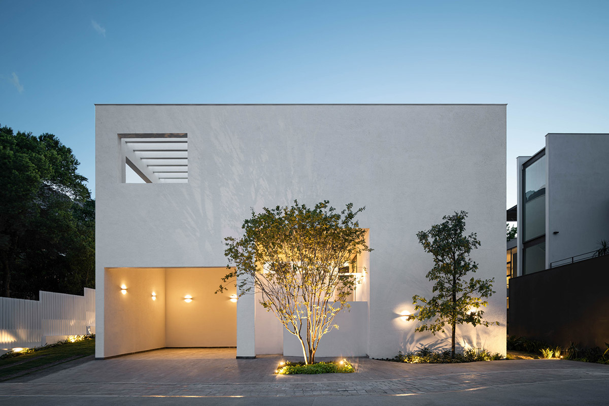 Cadaval & Solà-Morales' white excavated house features porous interior that expands activities