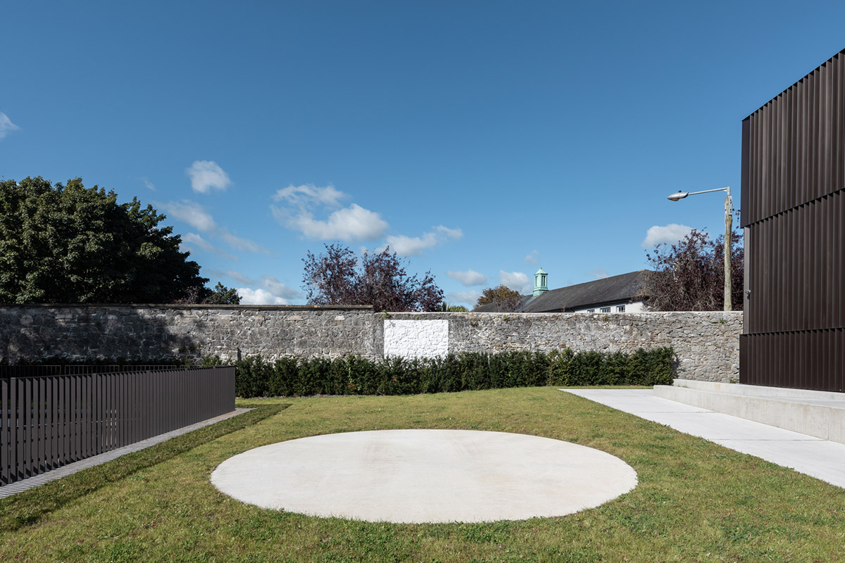 Mccullough Mulvin Architects adds two metal-clad volumes to convert former almshouse into art gallery