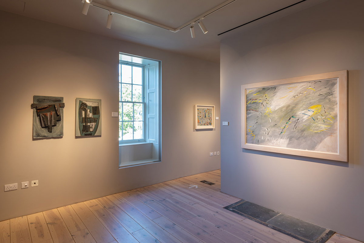 Mccullough Mulvin Architects adds two metal-clad volumes to convert former almshouse into art gallery