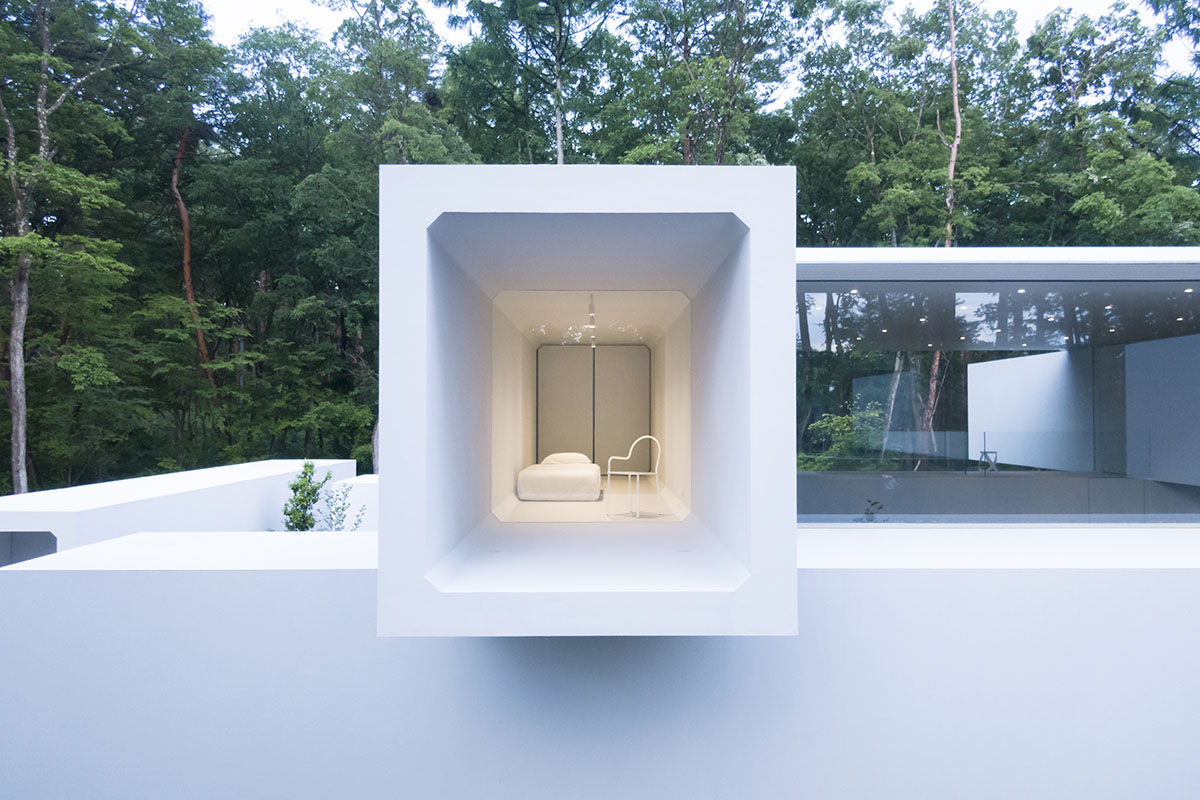 Nendo reveals tunnel-like archive and guesthouse in Nagano Prefecture, Japan