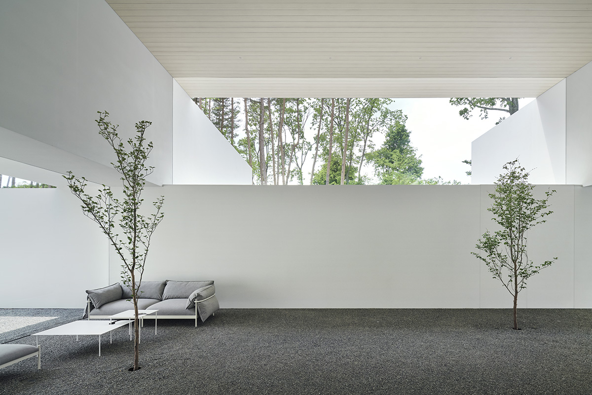 Nendo reveals tunnel-like archive and guesthouse in Nagano Prefecture, Japan