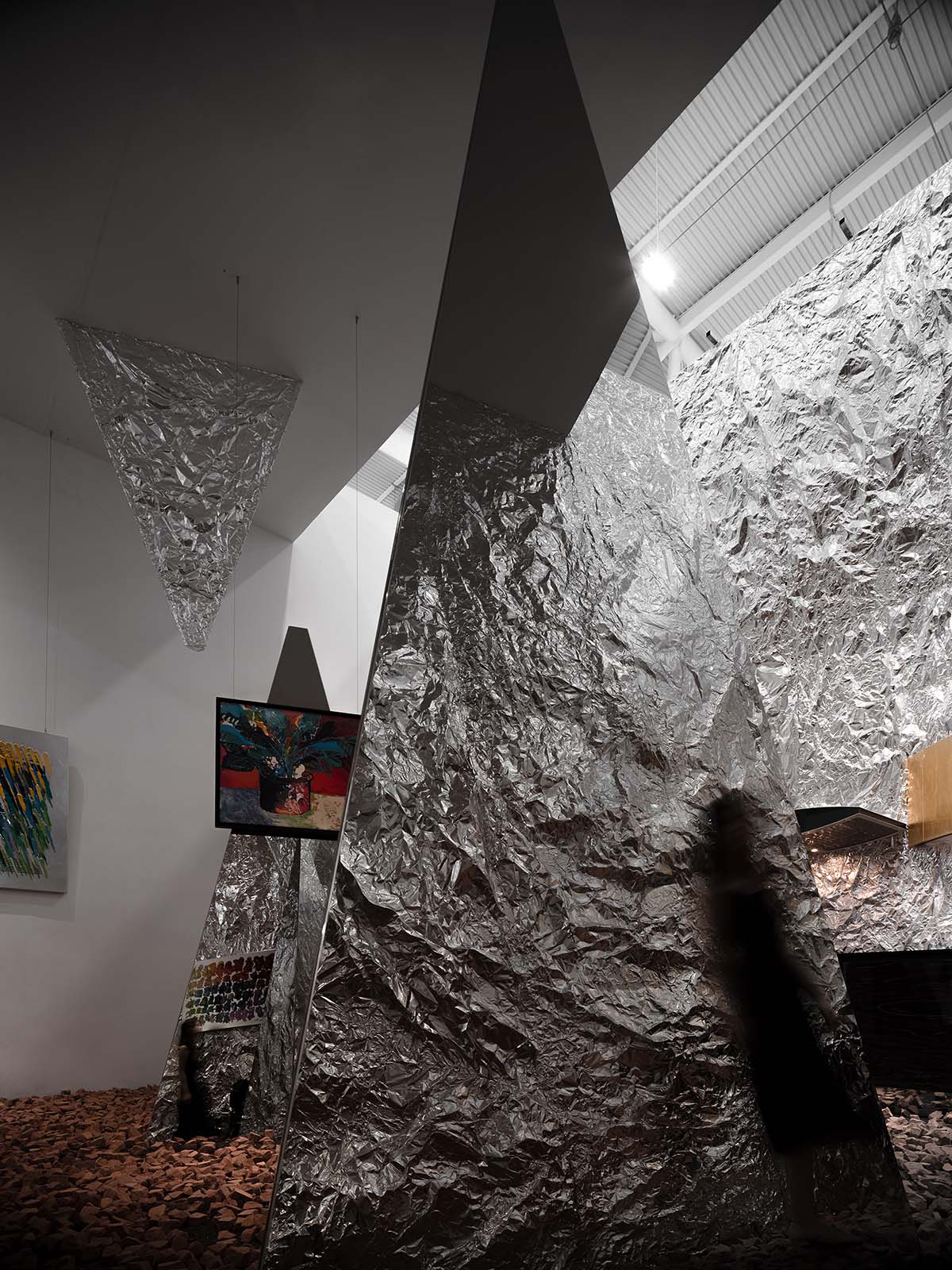 AD ARCHITECTURE creates metallic interiors for Mirror Gallery exhibition space in Shenzhen