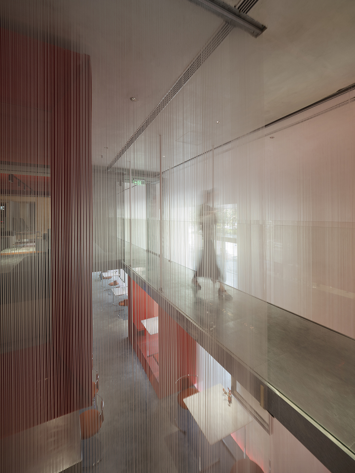 Waterfrom Design completes Doko Bar with giant bloody red boxes in Shenzhen