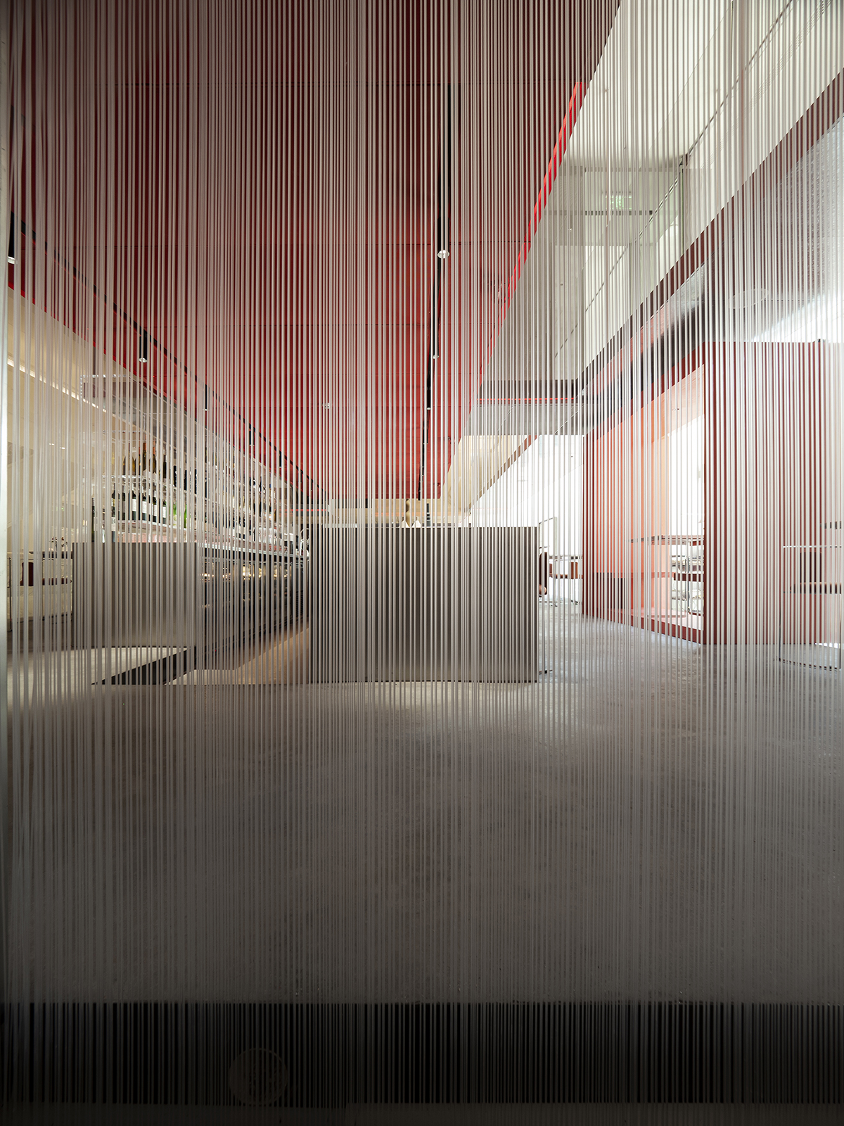 Waterfrom Design completes Doko Bar with giant bloody red boxes in Shenzhen