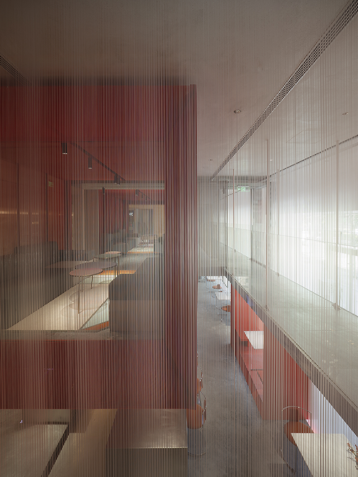 Waterfrom Design completes Doko Bar with giant bloody red boxes in Shenzhen