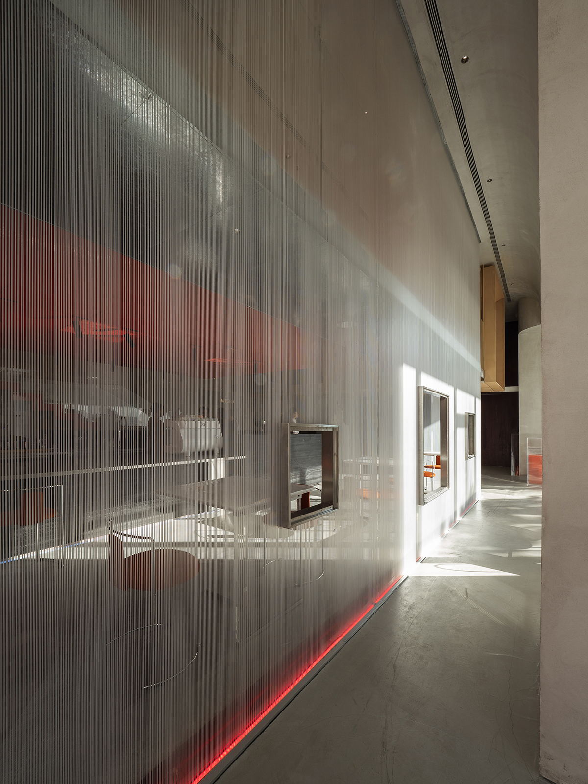 Waterfrom Design completes Doko Bar with giant bloody red boxes in Shenzhen
