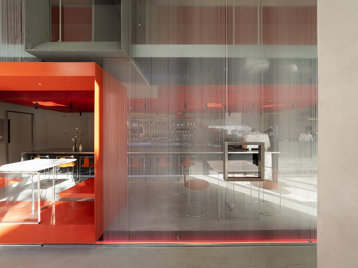 Waterfrom Design completes Doko Bar with giant bloody red boxes in Shenzhen