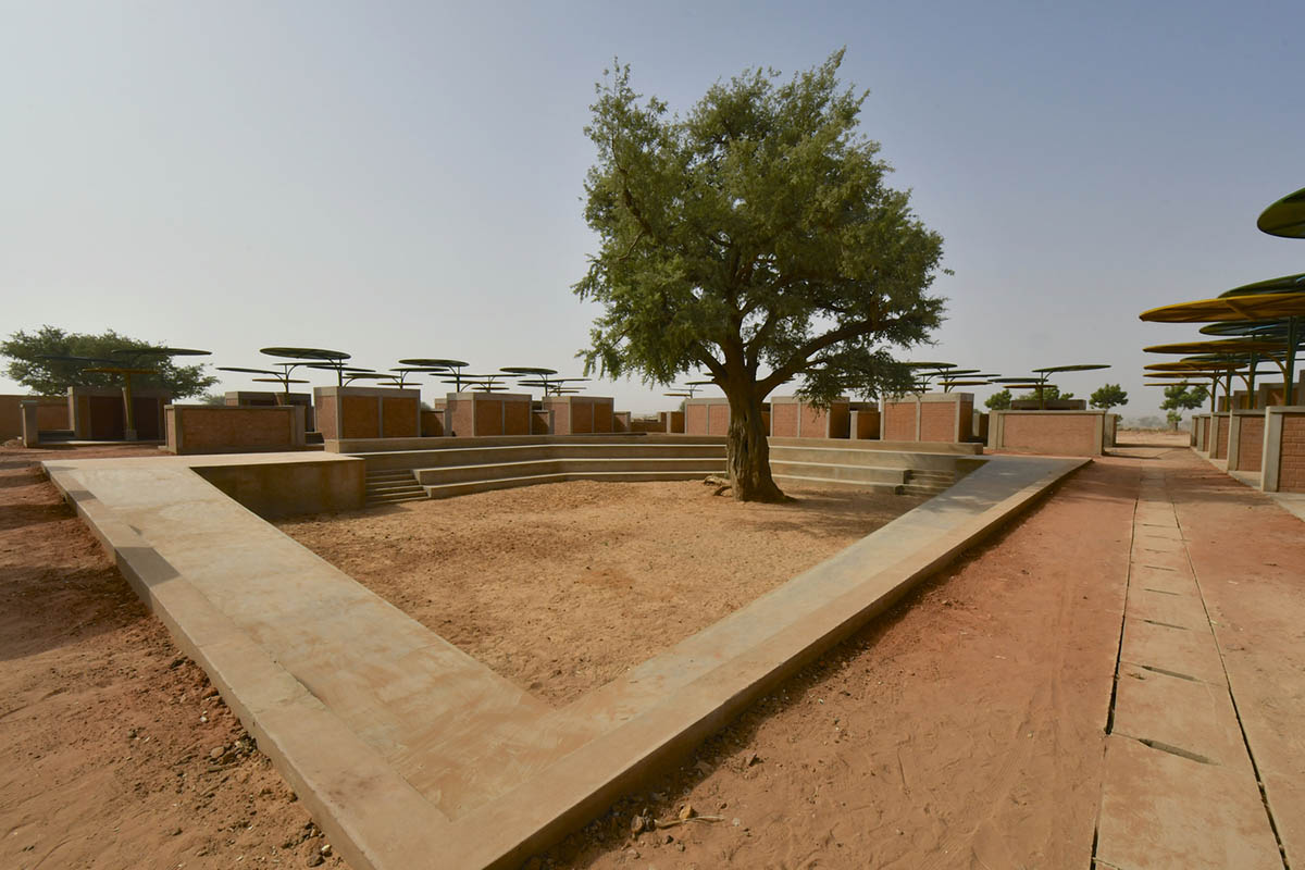 Colourful Metal Canopies Provide Thermal Comfort For Niger's Regional Market by Atelier Masōmī