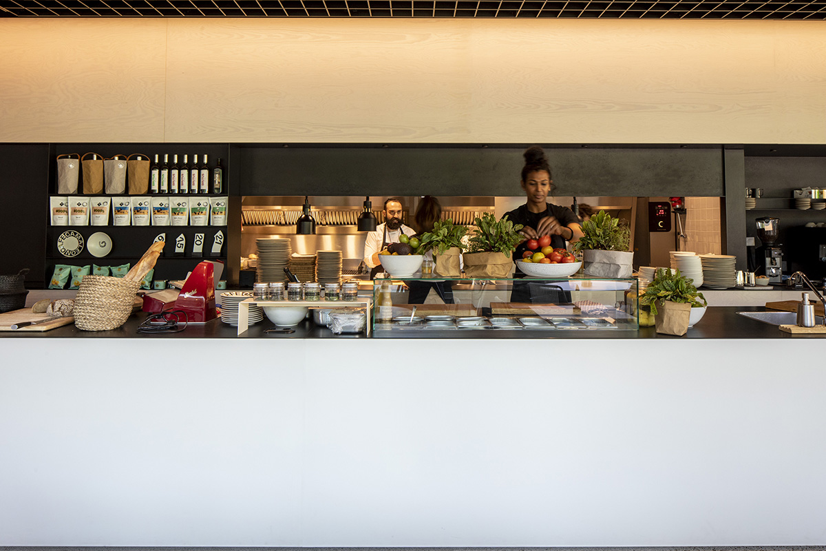 MVRDV adds striking color gradient to Café Camaleon in Berlin that unites three functions