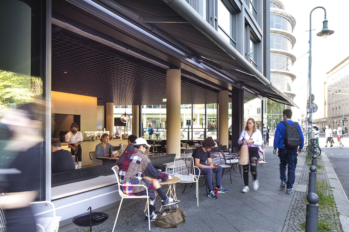 MVRDV adds striking color gradient to Café Camaleon in Berlin that unites three functions