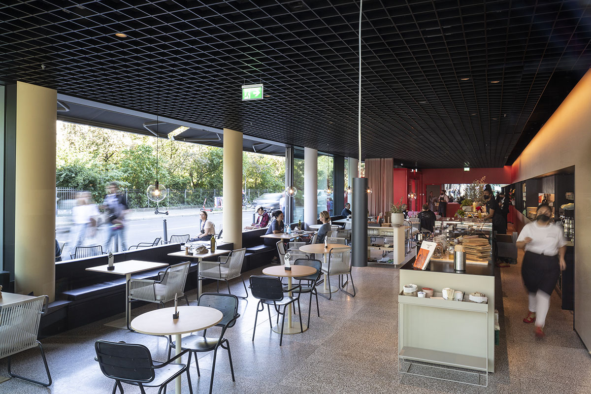 MVRDV adds striking color gradient to Café Camaleon in Berlin that unites three functions