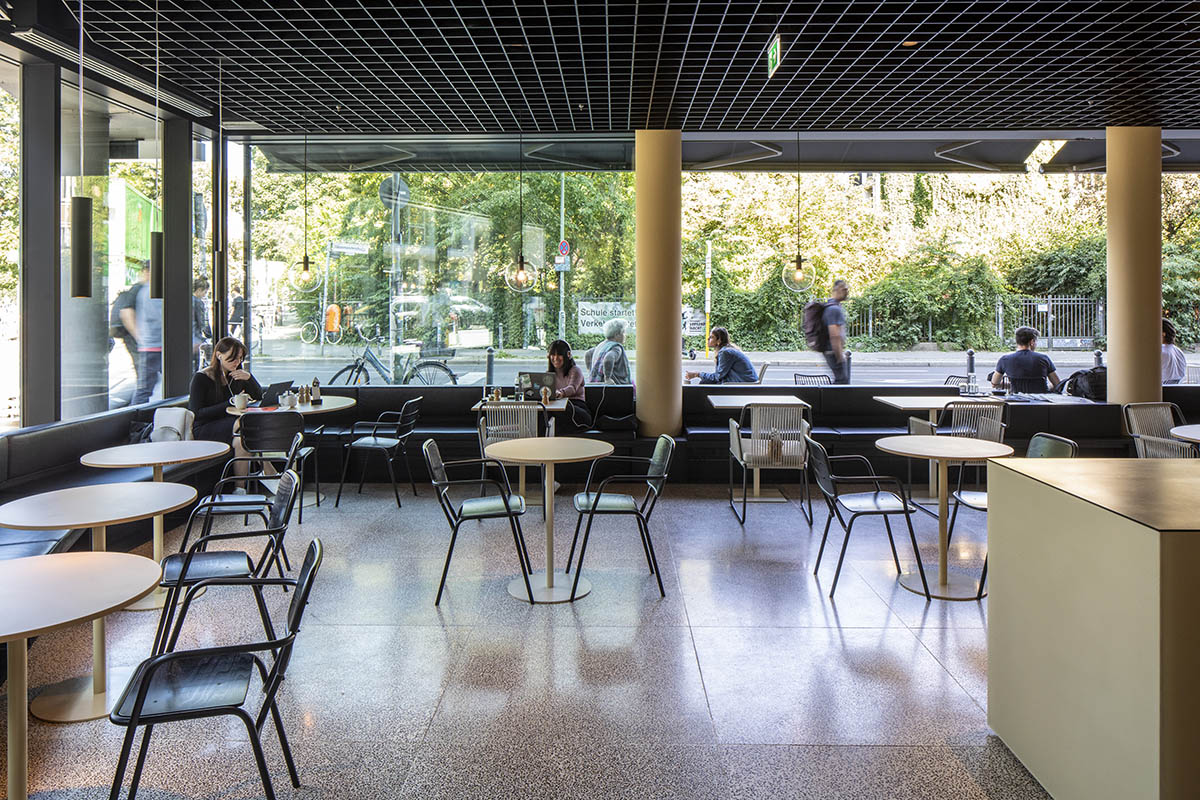 MVRDV adds striking color gradient to Café Camaleon in Berlin that unites three functions