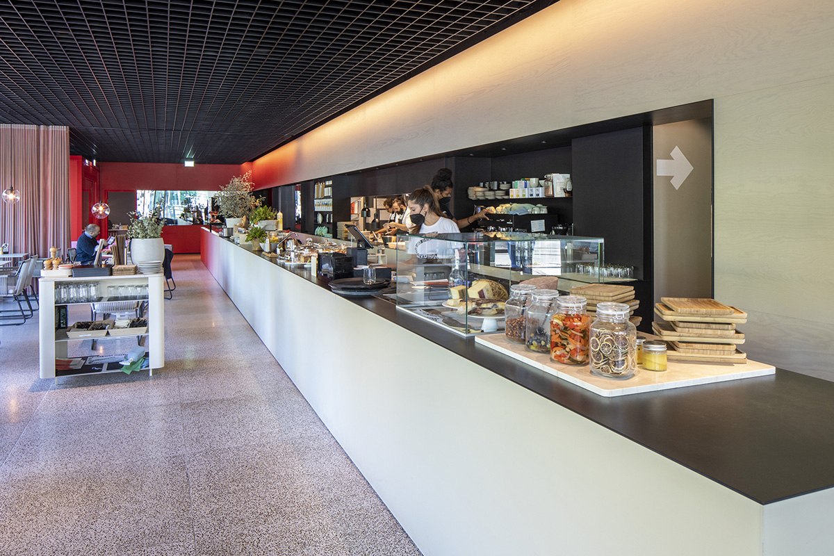 MVRDV adds striking color gradient to Café Camaleon in Berlin that unites three functions