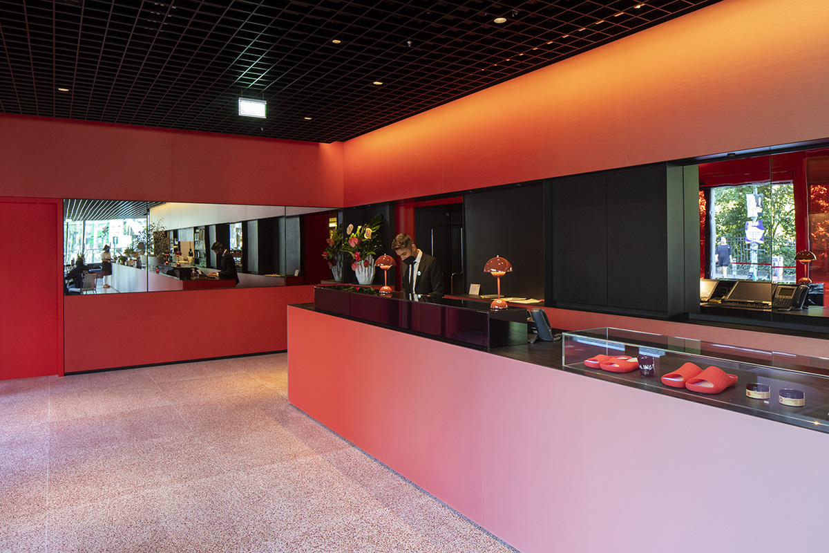 MVRDV adds striking color gradient to Café Camaleon in Berlin that unites three functions