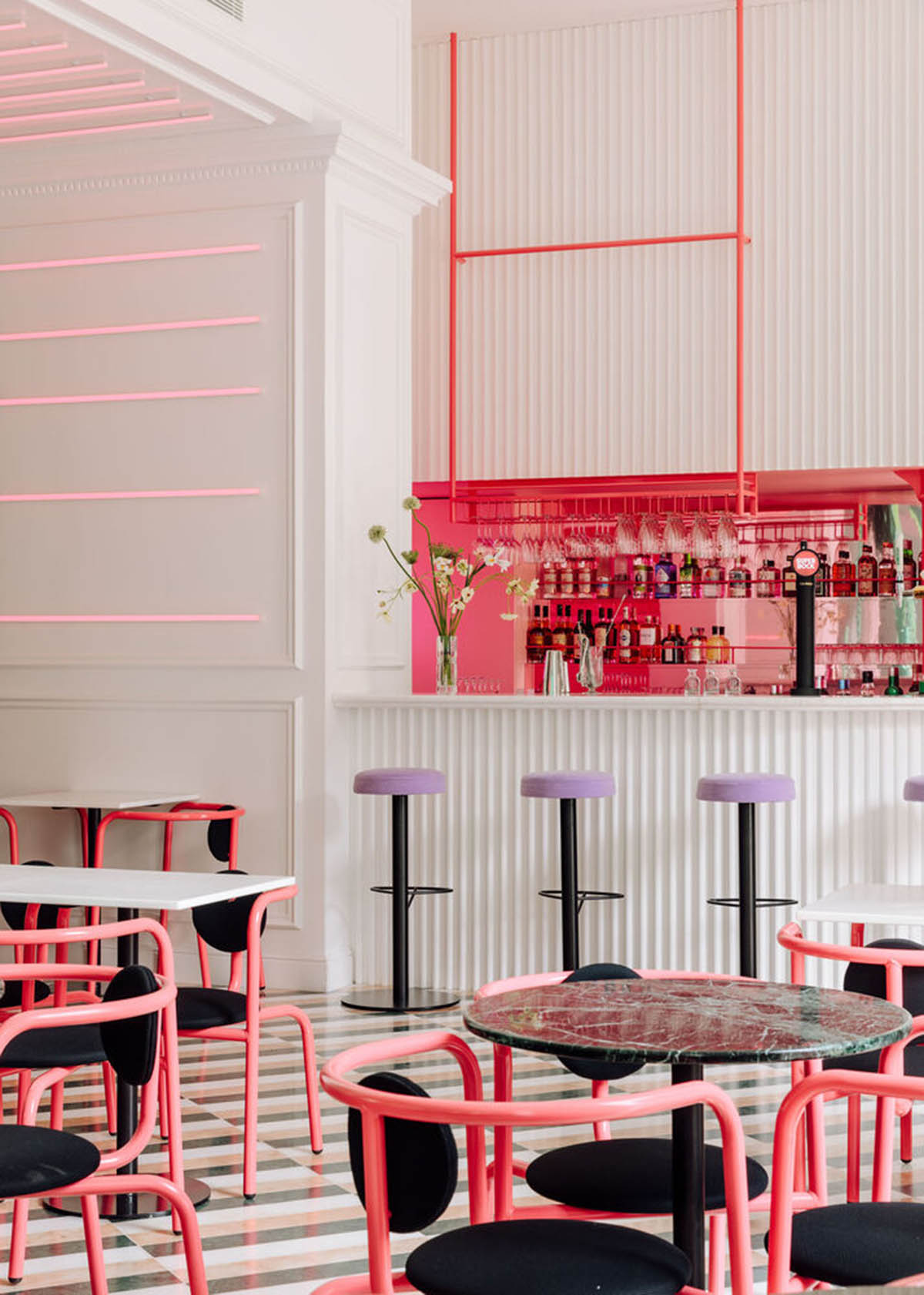 Colored neon lights bring 1920s Art Deco feeling to LULU Bar and Restaurant designed by DC.AD