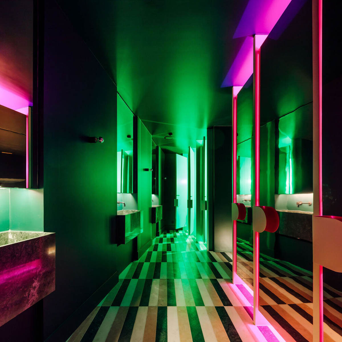 Colored neon lights bring 1920s Art Deco feeling to LULU Bar and Restaurant designed by DC.AD