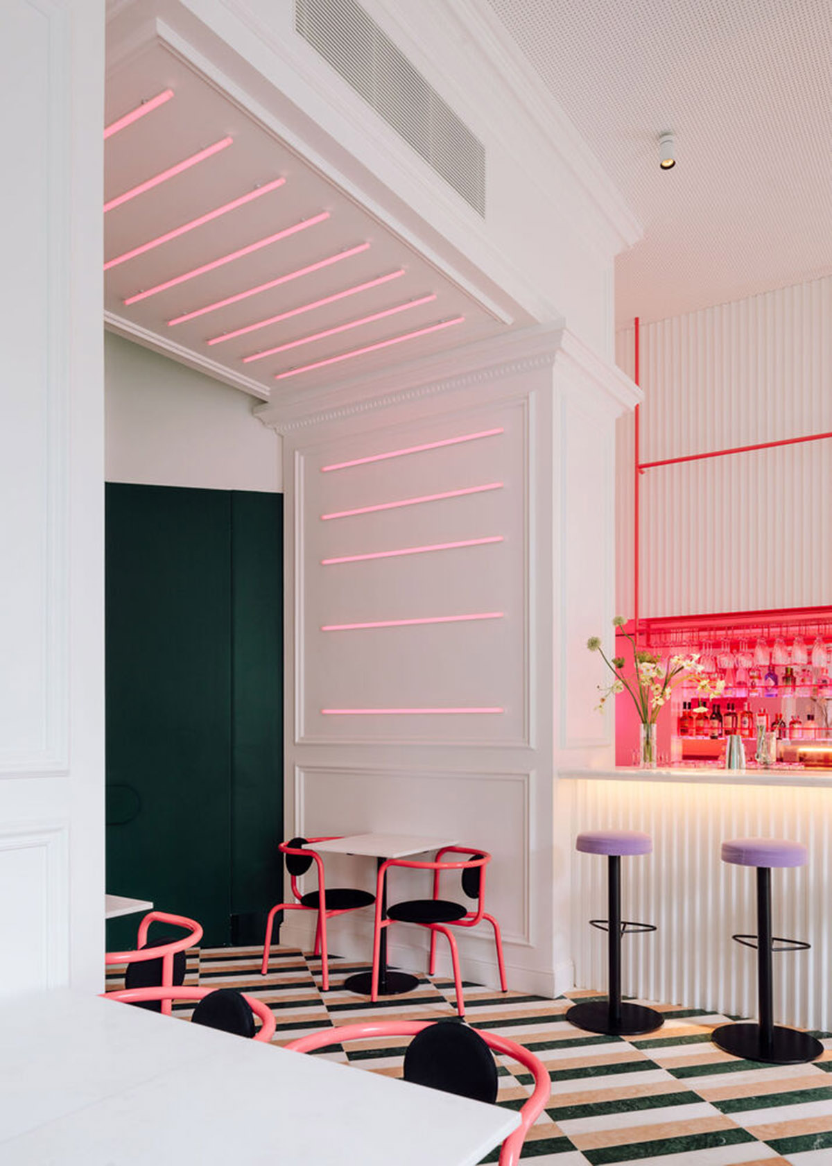 Colored neon lights bring 1920s Art Deco feeling to LULU Bar and Restaurant designed by DC.AD