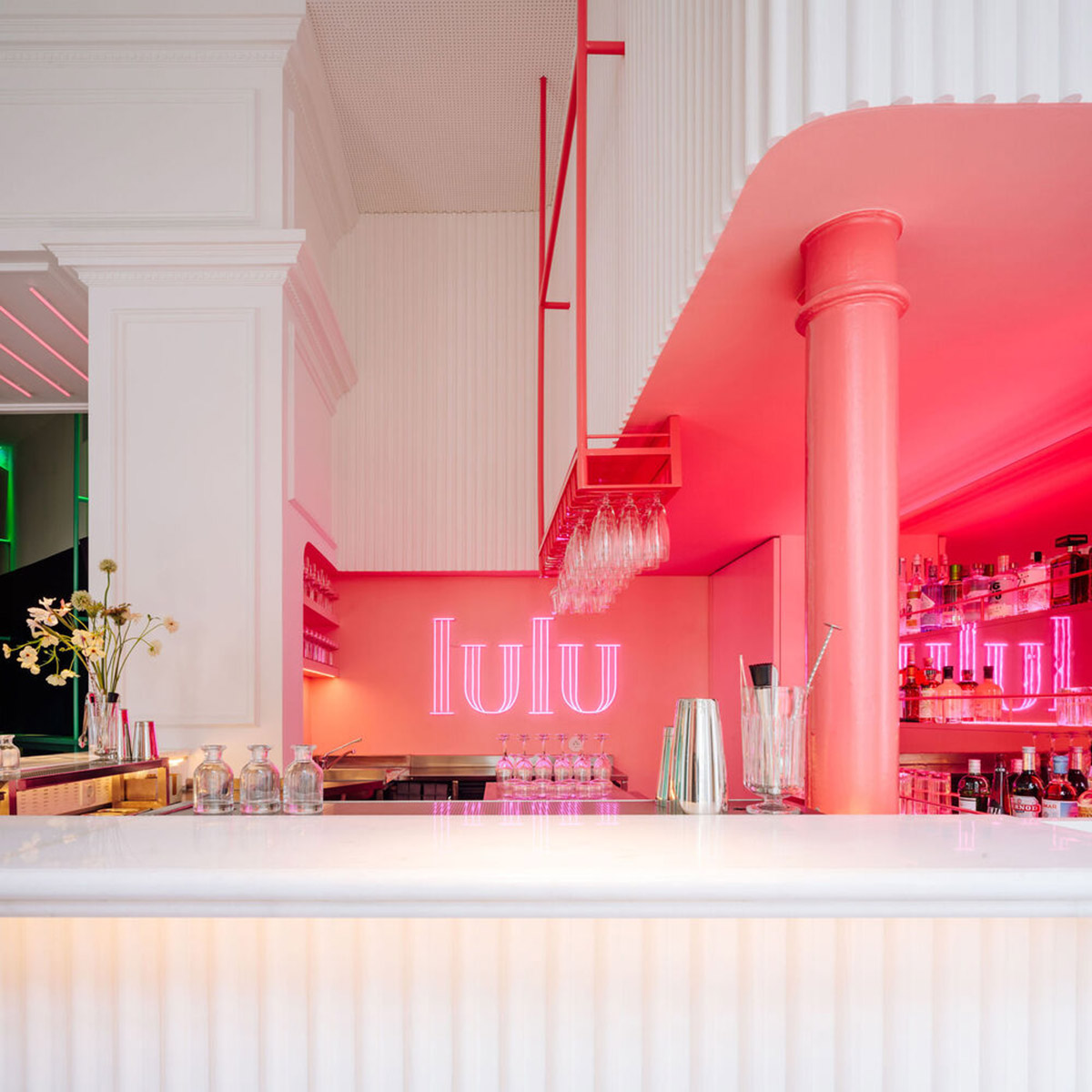 Colored neon lights bring 1920s Art Deco feeling to LULU Bar and Restaurant designed by DC.AD