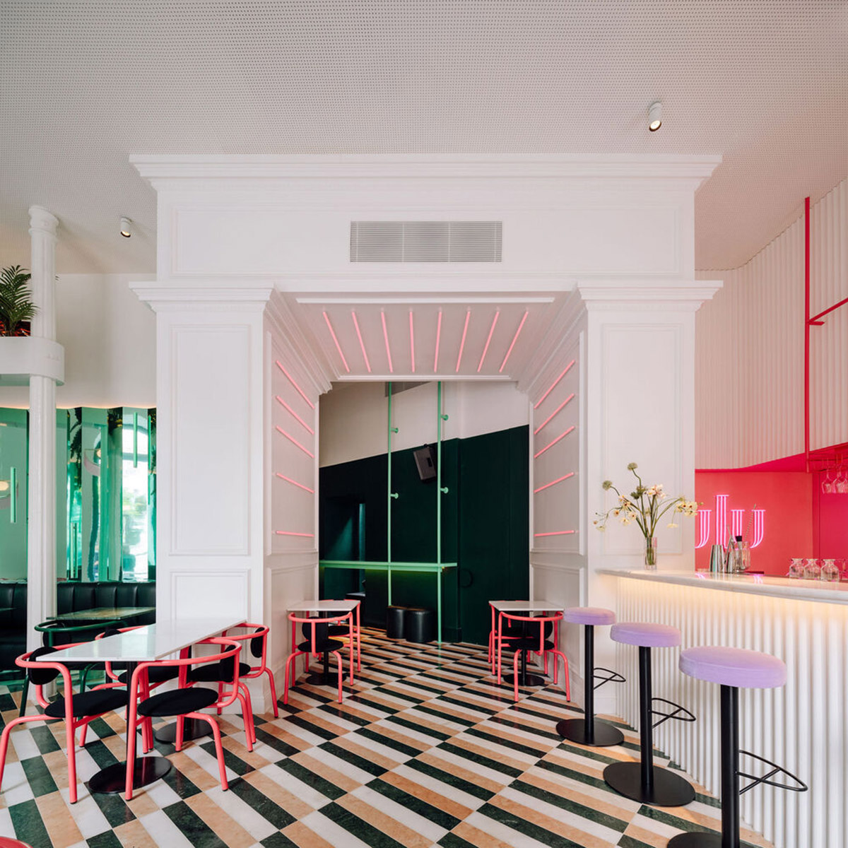 Colored neon lights bring 1920s Art Deco feeling to LULU Bar and Restaurant designed by DC.AD