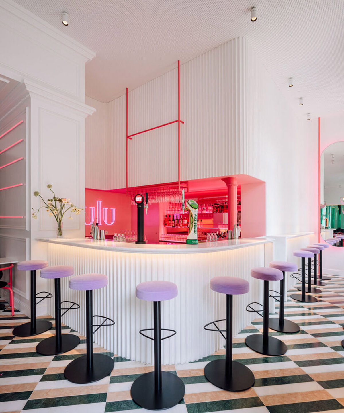 Colored neon lights bring 1920s Art Deco feeling to LULU Bar and Restaurant designed by DC.AD