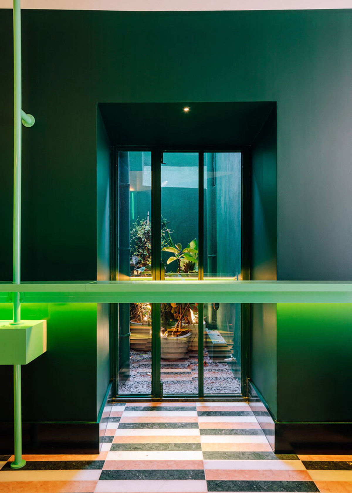 Colored neon lights bring 1920s Art Deco feeling to LULU Bar and Restaurant designed by DC.AD