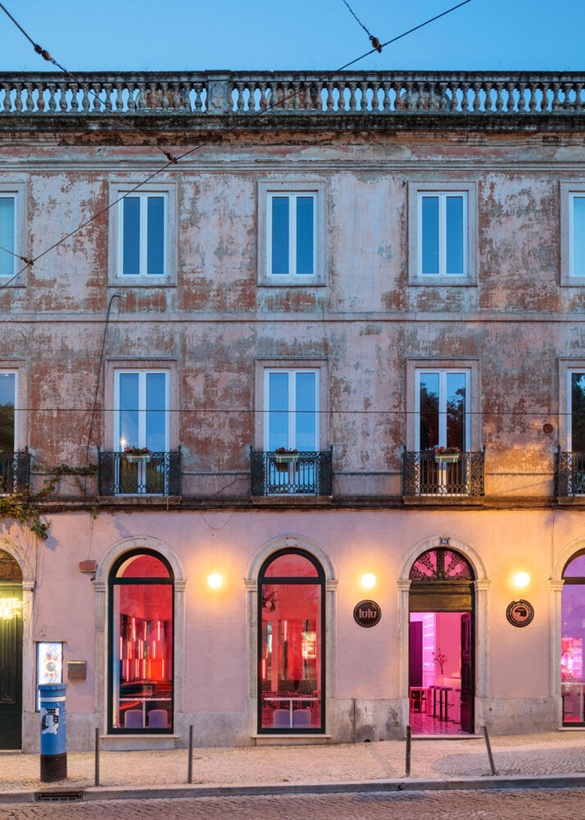 Colored neon lights bring 1920s Art Deco feeling to LULU Bar and Restaurant designed by DC.AD