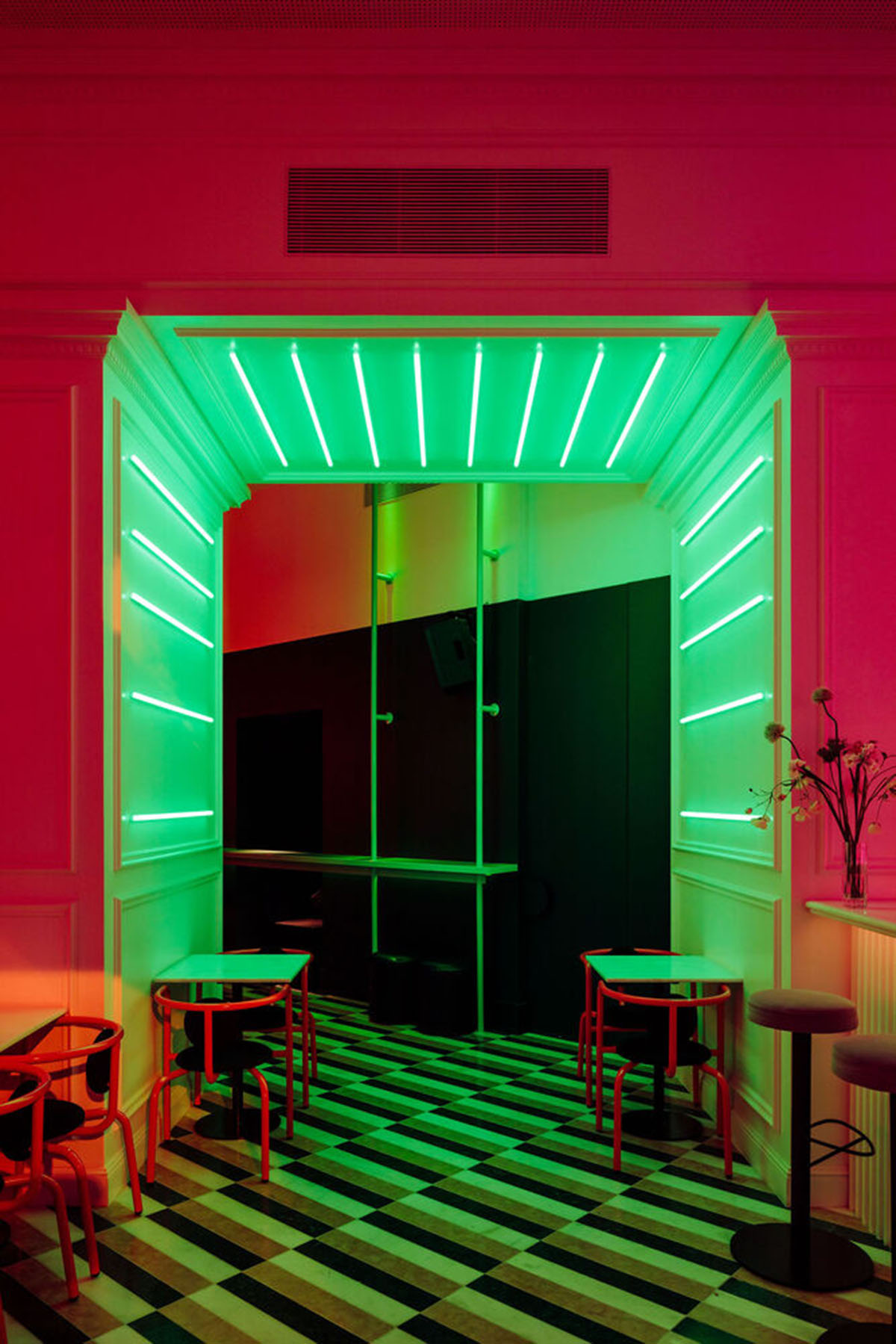 Colored neon lights bring 1920s Art Deco feeling to LULU Bar and Restaurant designed by DC.AD