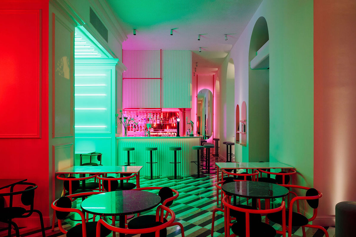 Colored neon lights bring 1920s Art Deco feeling to LULU Bar and Restaurant designed by DC.AD